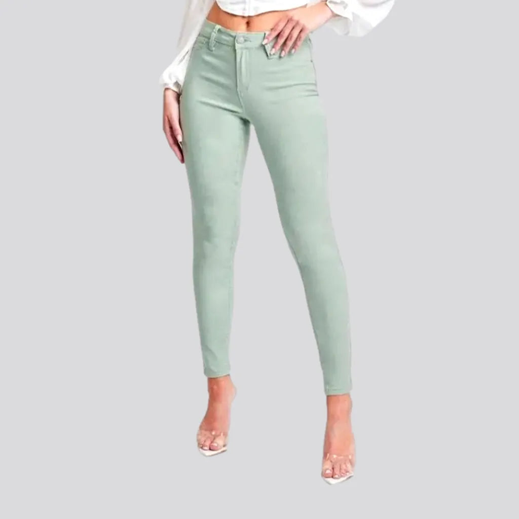 High-waist women's pale-green jeans