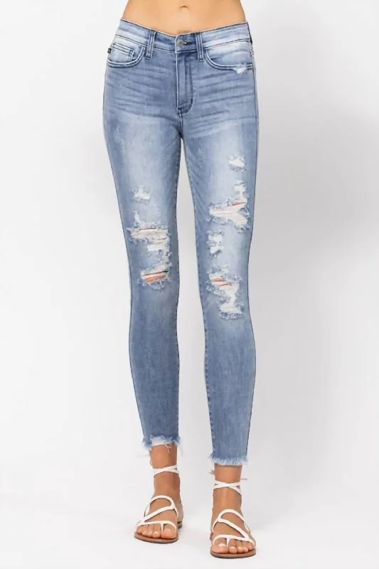 Distressed Denim Skinny Jeans In Washed Blue